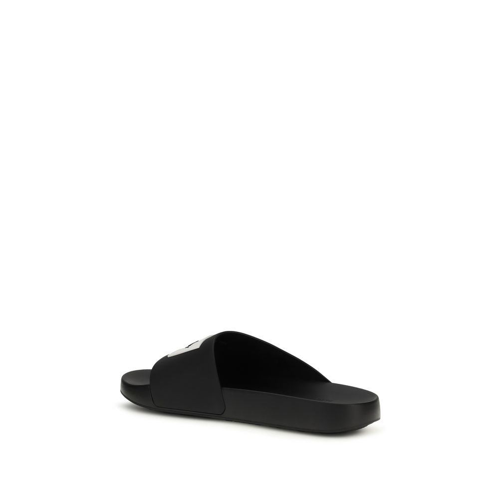 Schwarze Gummipantoffeln
