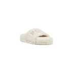 Cremefarbene Textil-Slipper