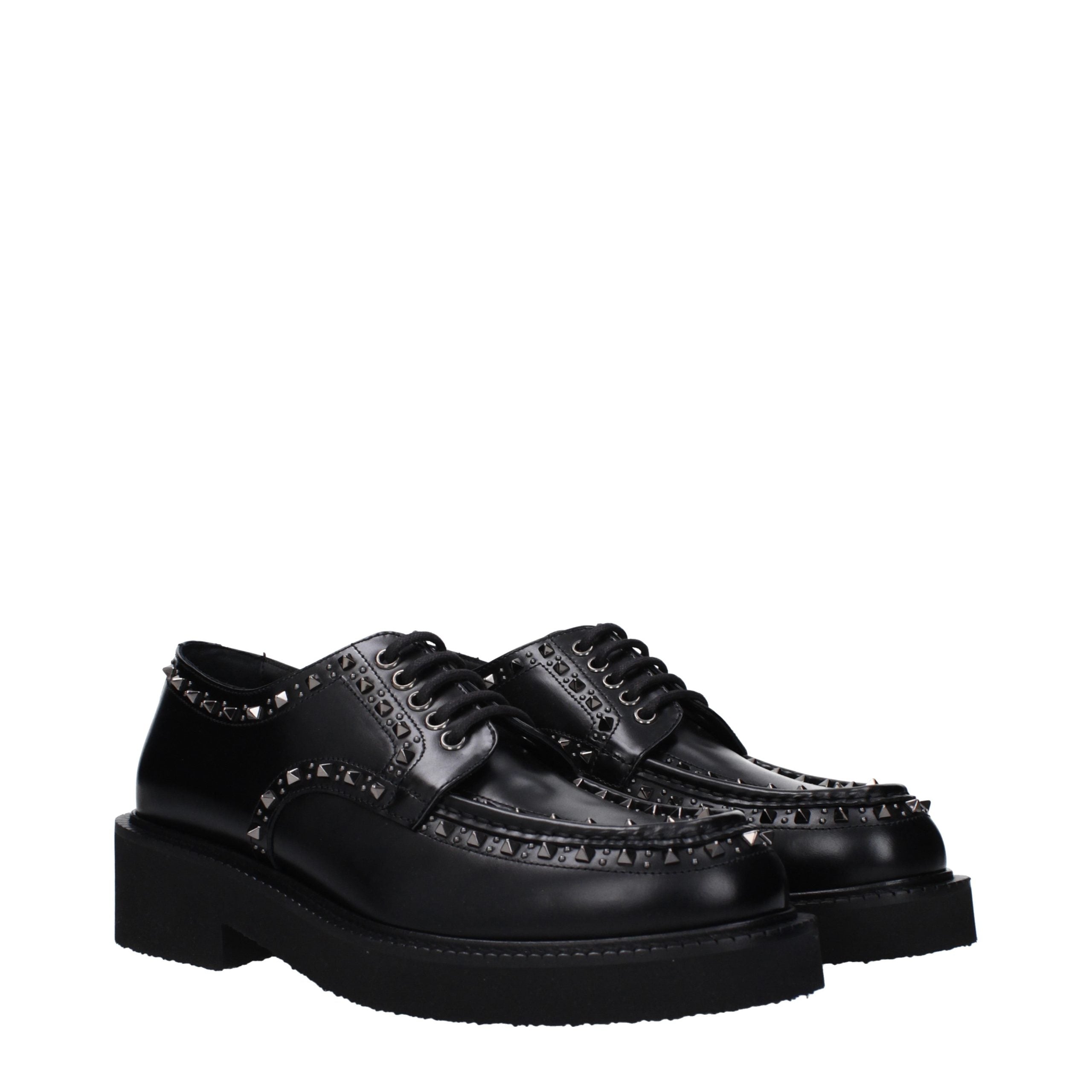 Schwarze Oxford- und Derby-Schuhe aus Leder