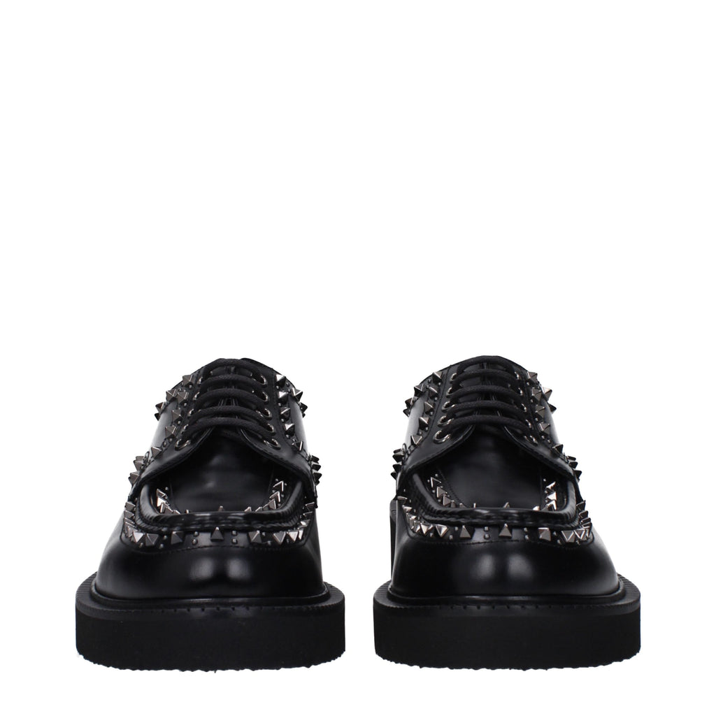 Schwarze Oxford- und Derby-Schuhe aus Leder