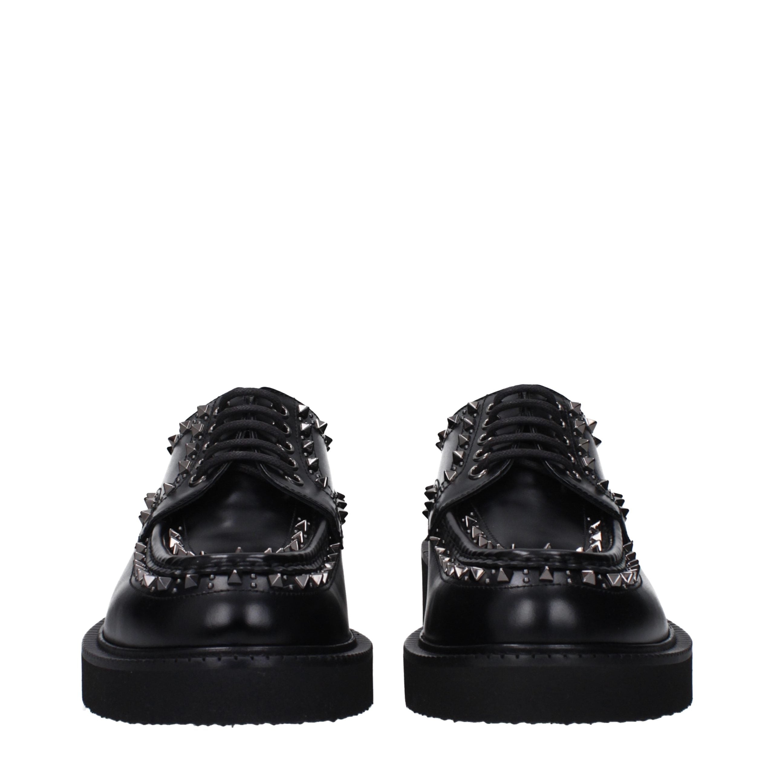 Schwarze Oxford- und Derby-Schuhe aus Leder
