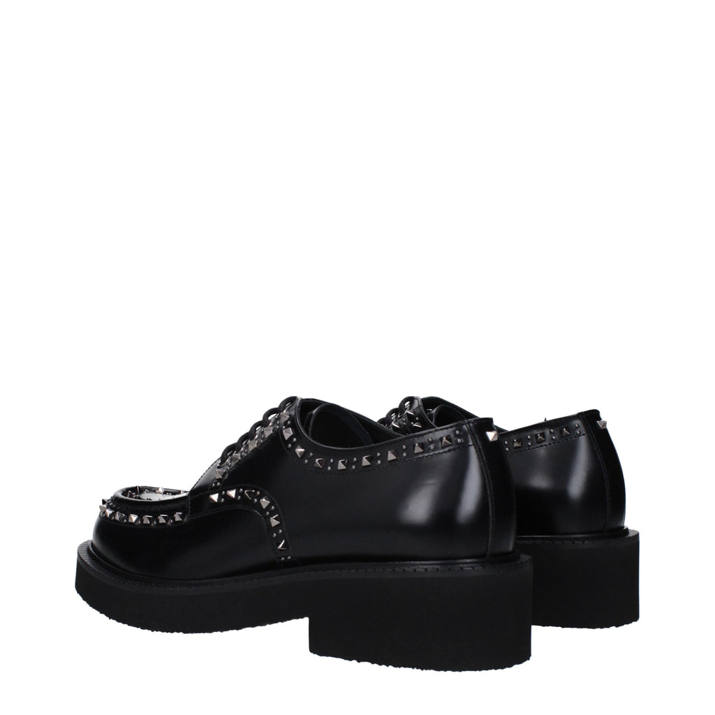 Schwarze Oxford- und Derby-Schuhe aus Leder