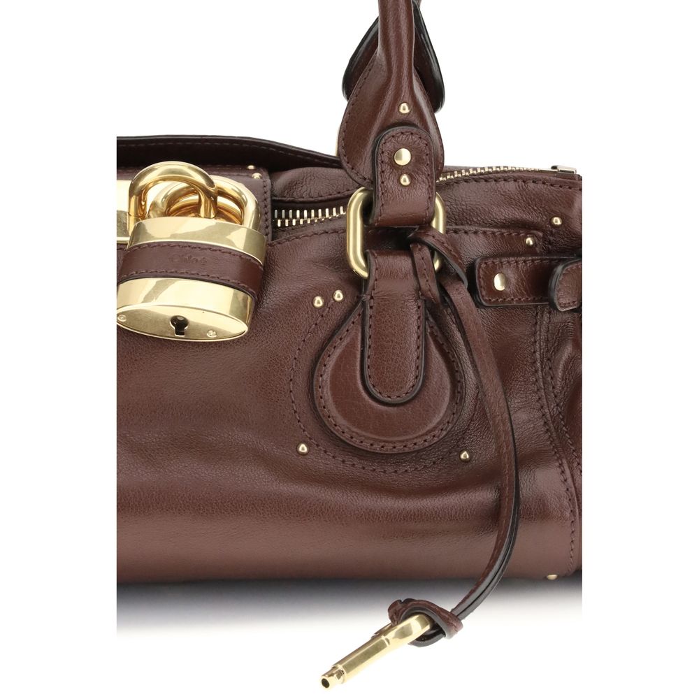 Schultertasche Bos Taurus aus bordeauxrotem Kalbsleder