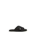 Schwarze flache Sandalen aus Leder
