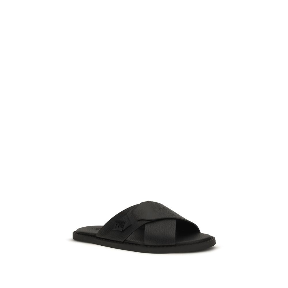 Schwarze flache Sandalen aus Leder