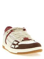 Mehrfarbige Sneaker mit Skelett-Applikation