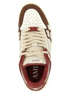 Mehrfarbige Sneaker mit Skelett-Applikation