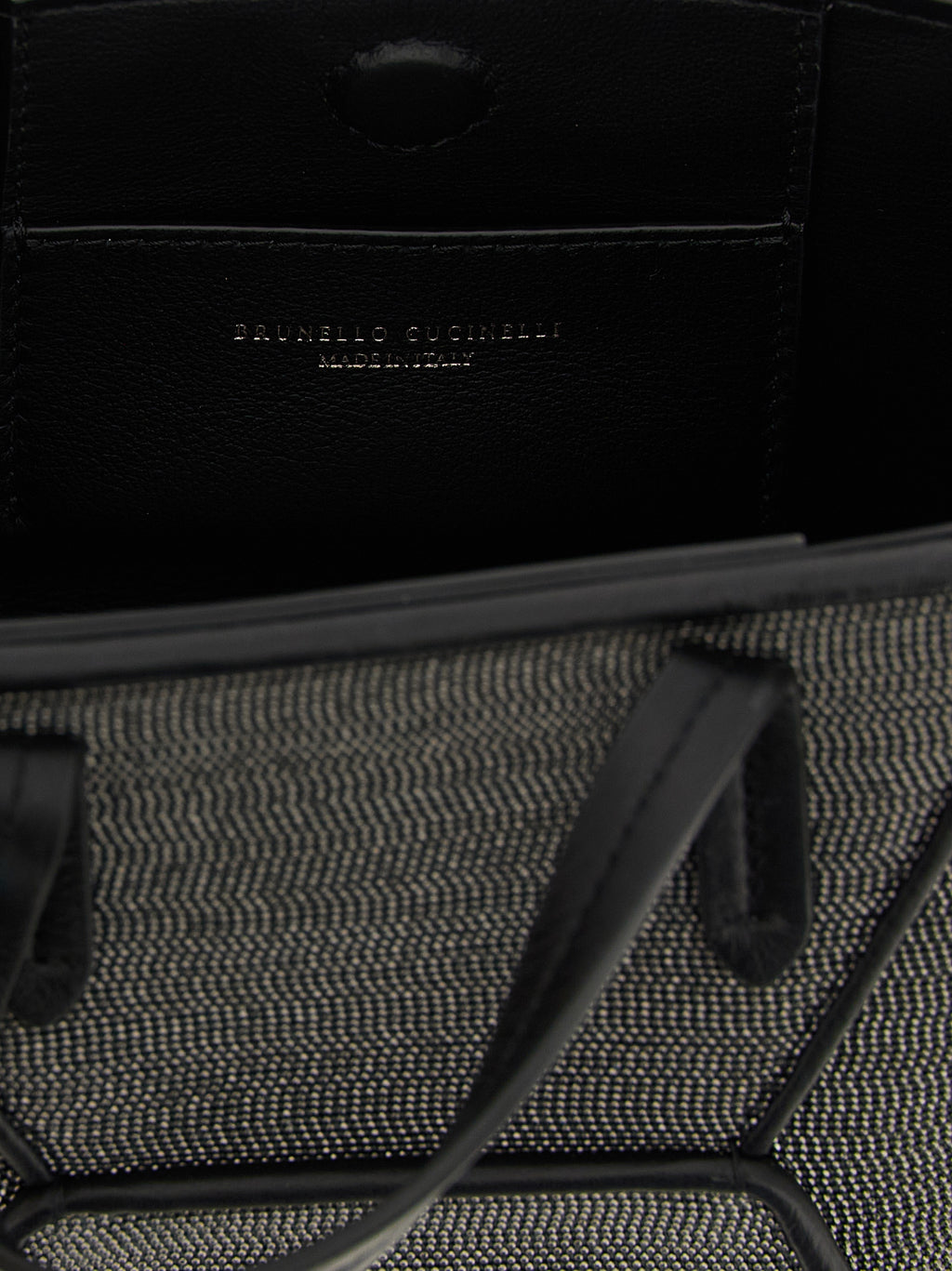 Schwarze Handtasche aus Messing