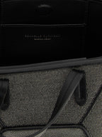 Schwarze Handtasche aus Messing