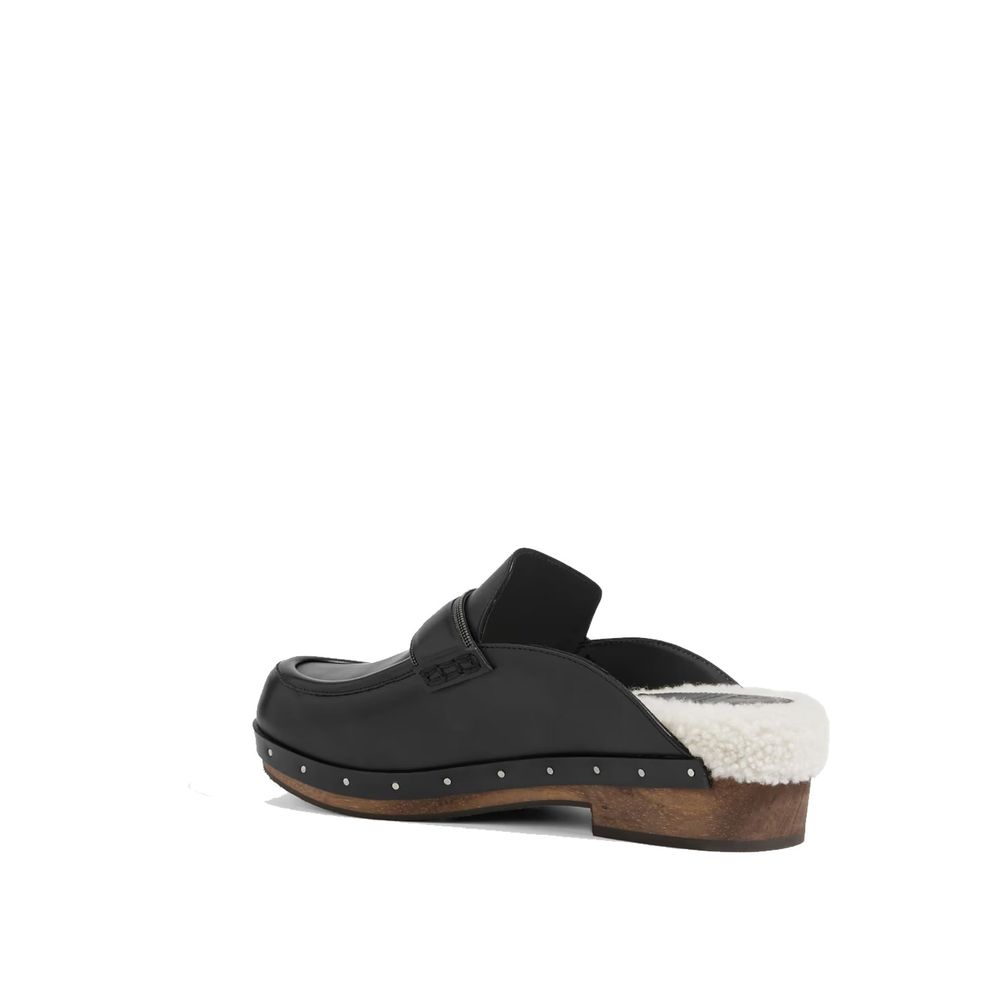 Schwarze Mules aus Leder