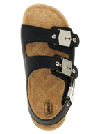 Schwarze flache Sandalen aus Leder 320546