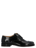 Schwarze Oxford- und Derby-Schuhe aus Kalbsleder