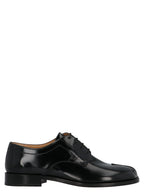 Schwarze Oxford- und Derby-Schuhe aus Kalbsleder