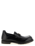 Schwarze Slipper aus Leder