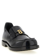 Schwarze Slipper aus Leder