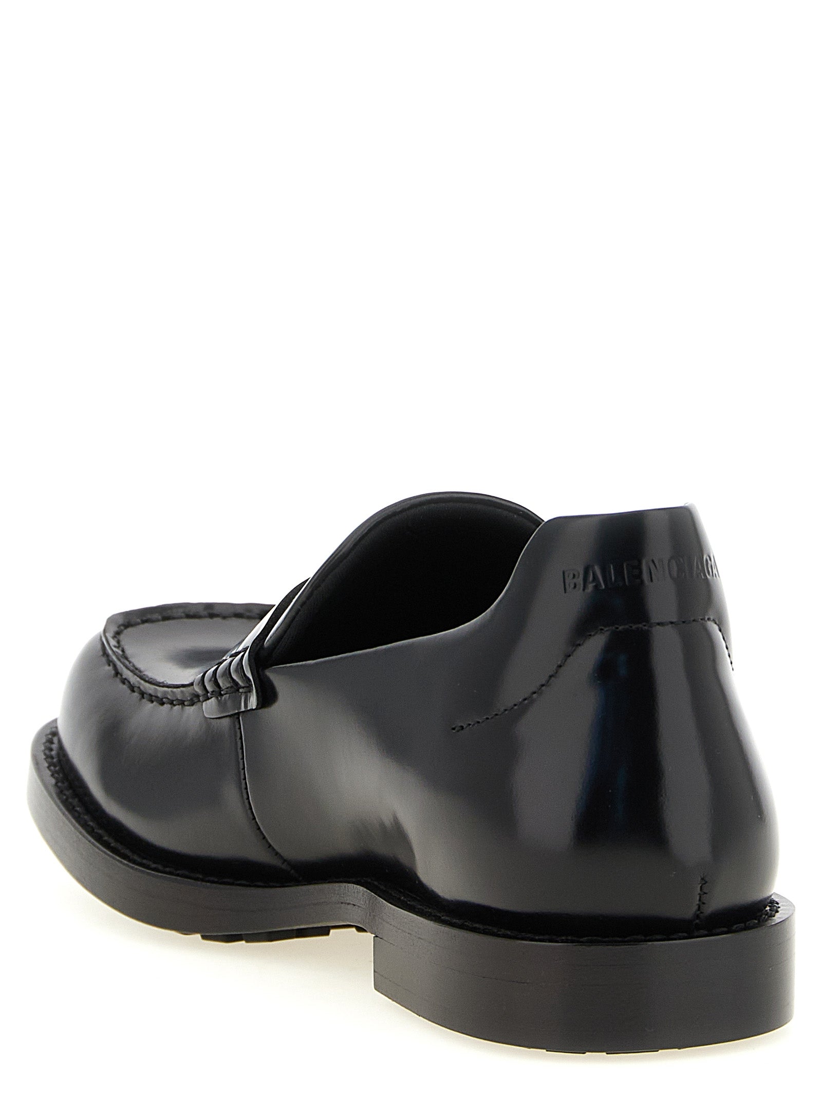 Schwarze Slipper aus Leder
