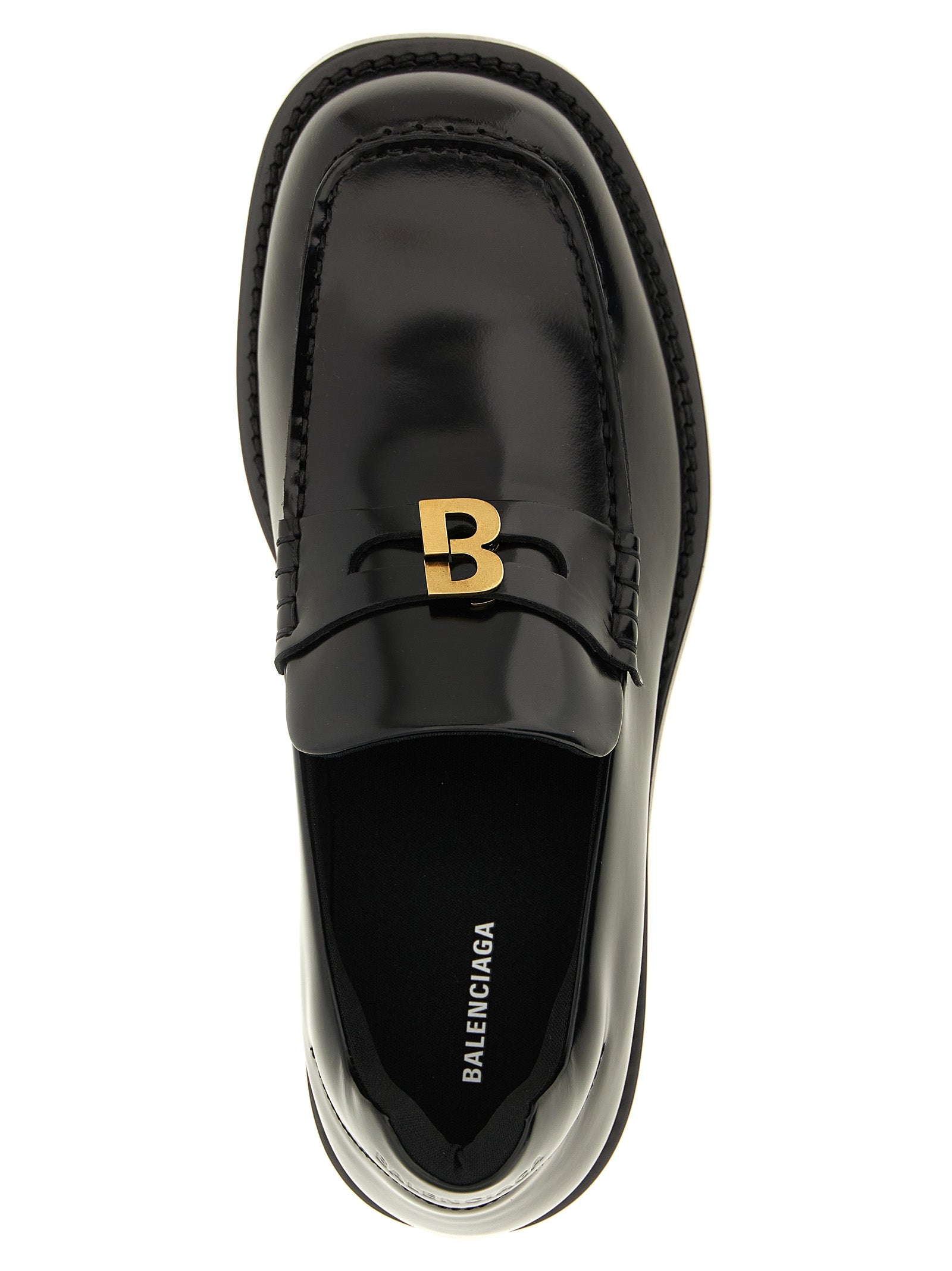 Schwarze Slipper aus Leder