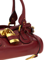 Schultertasche aus bordeauxrotem Büffelleder