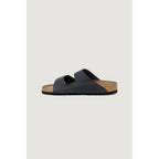 Schwarze Kunstleder-Slipper